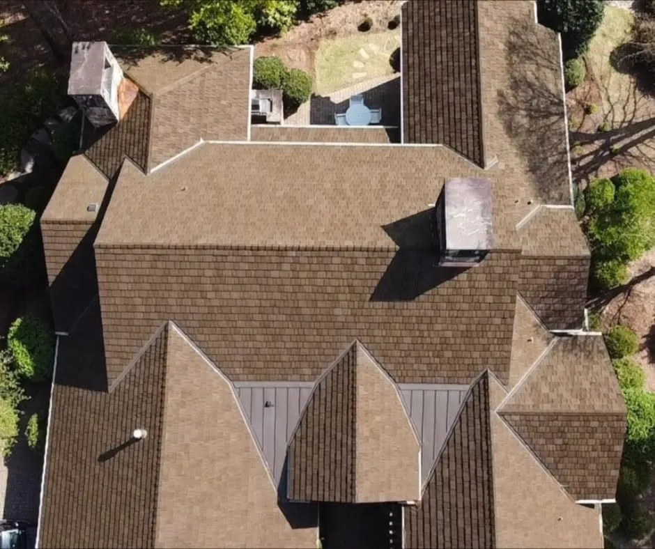 Aerial view of shingle roof tear-off and decking inspection in La Mesa CA – thorough replacement process revealing hidden damage