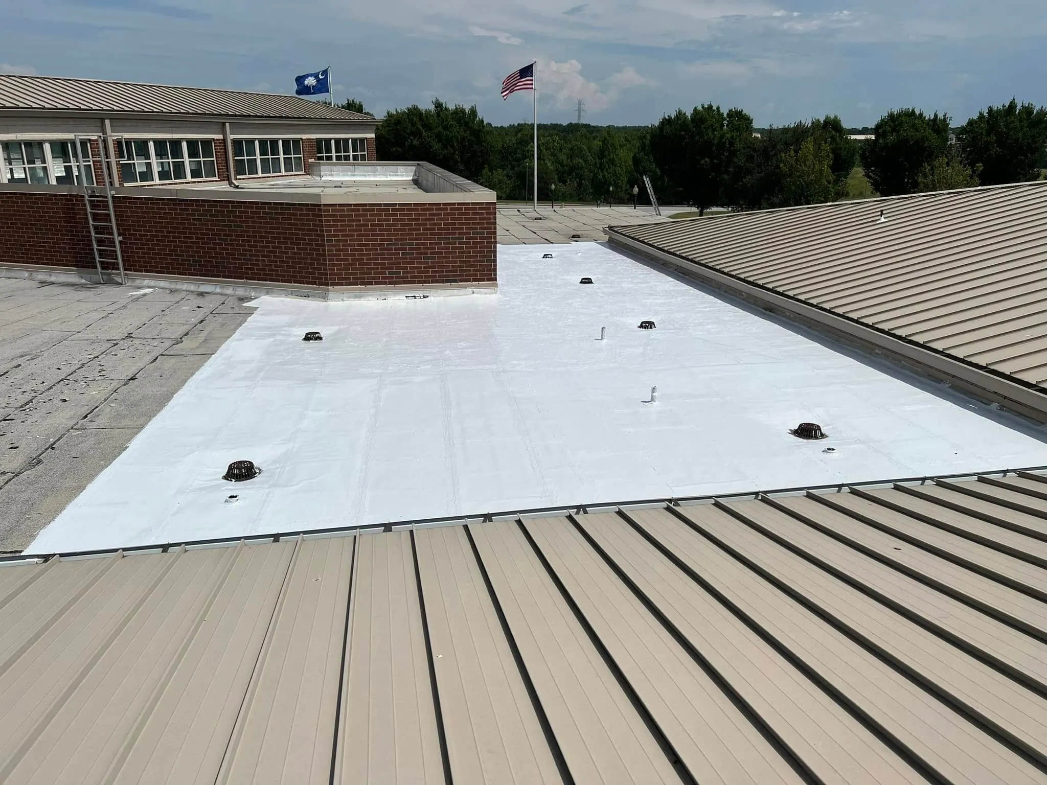 Flat roof TPO membrane system on La Mesa CA commercial building – roof repair vs replacement evaluation by experienced roofing contractors